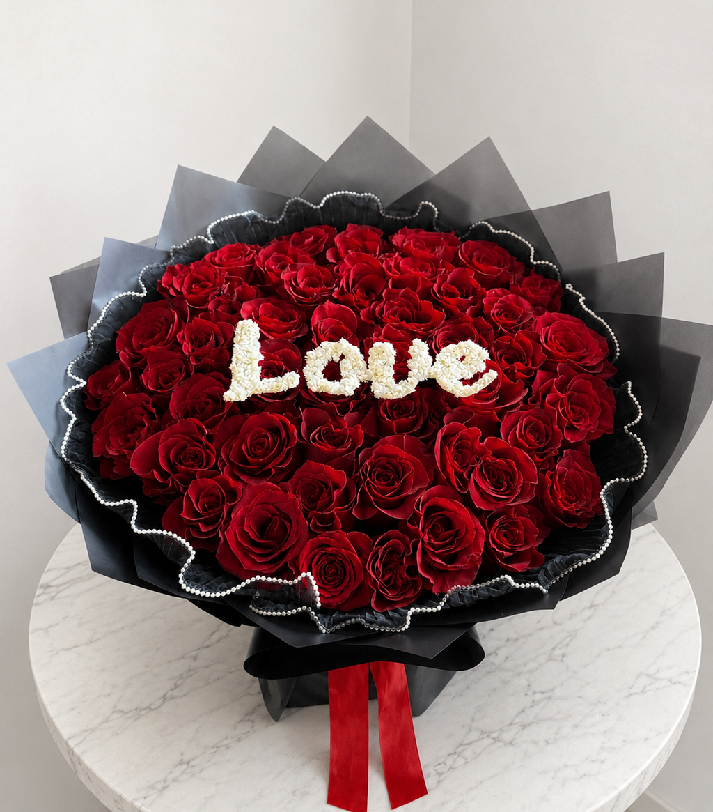 Deeply in Love luxury red rose bouquet with white LOVE lettering in Edmonton