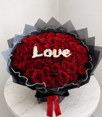 Deeply in Love luxury red rose bouquet with white LOVE lettering in Edmonton