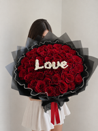 Deeply in Love luxury red rose bouquet with white LOVE lettering in Edmonton