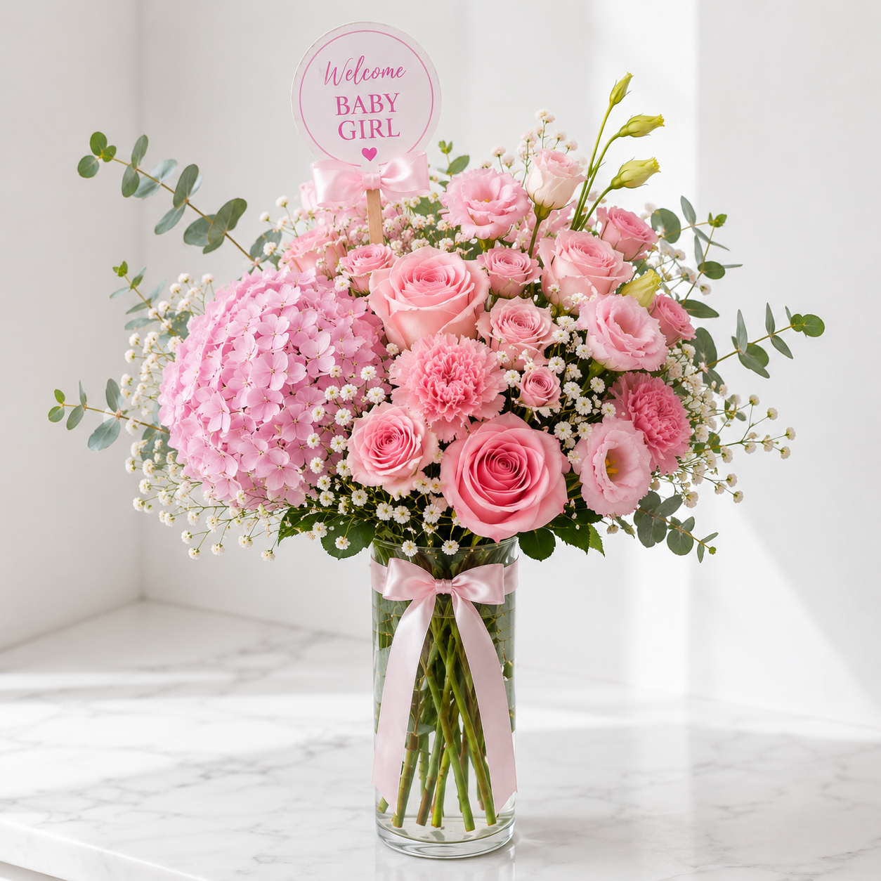 Pink bouquet , Welcome baby girl , featuring pink hydrangeas, pink roses, eucalyptus in a vase- same day delivery in Edmonton 